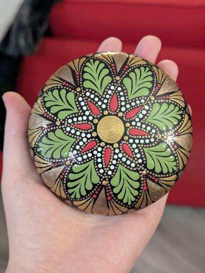 The same stone with the flower design, from the top down, to better see the symmetry.