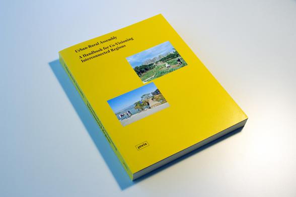 A yellow book with two photos on the cover lies at an angle on a light-coloured surface. 
Foto: K.Uhlich/IÖR-Media