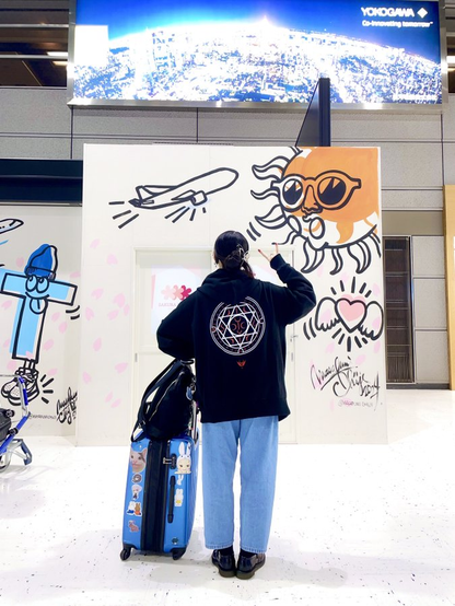 Hima with luggage.