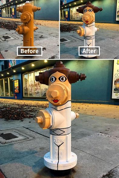 Fire hydrant with five spigots. Two stick out on opposite sides at the top, which were planted brown to be Leila’s cinnamon roll hair buns. One outlet forms a nose/mouth for leia. Painted yellow with eyeballs. The rest is painted white to look like her robes, with one yellow spigot pointing out like a hand. It’s quite something.