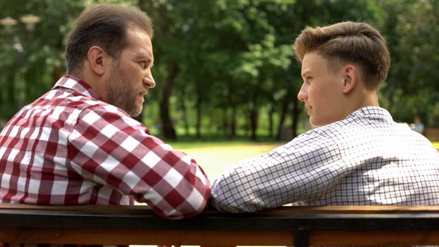 Dad Talking To Teen Son