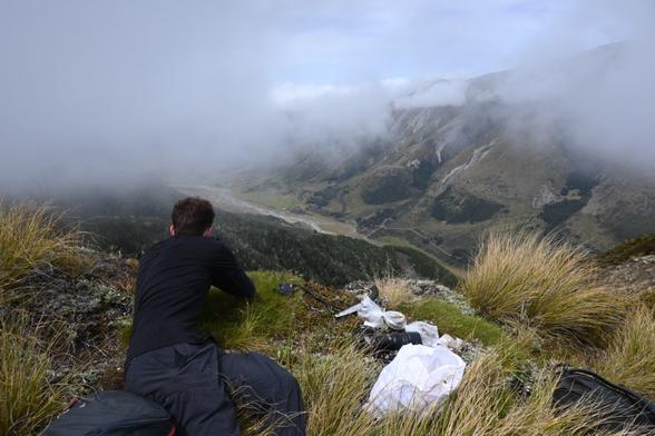 A photo of Will Frost, one of our PhD student demonstrators on the course, looking up the valley of the Saint James from the flank of Mount Faust. The cloud cleared and we got some spectacular views. Will was helping our students and also looking for tiger moths for his PhD research.