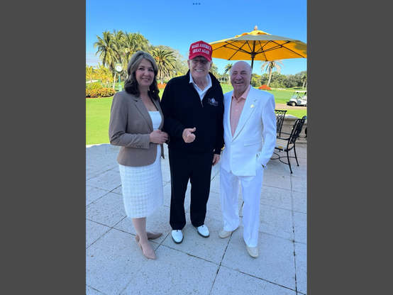 Danielle Smith and Kevin O’Leary, standing at Mar-a-Lago with Trump, standing between them, big smiles, schmoozing, and preparing to pay homage to the convicted rapist, felon and white supremacist President of the US