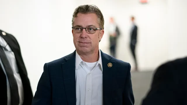 Rep. Andy Ogles (R-Tenn.) leaves a closed-door House Republican Conference meeting on Tuesday, December 10, 2024.