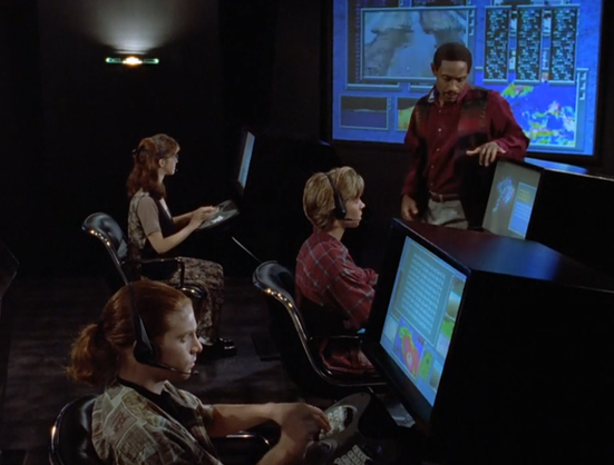 Undersea computer hacking room from SeaQuest DSV Season 1 episode 11 Photon Bullet. Back left actress Sarah Koskoff, front left actor Seth Green, middle actor Jonathan Brandis, back right actor Tim Russ.
