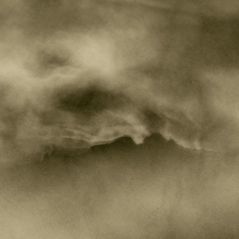 Image of Dartmoor Tor wreathed in mist and cloud