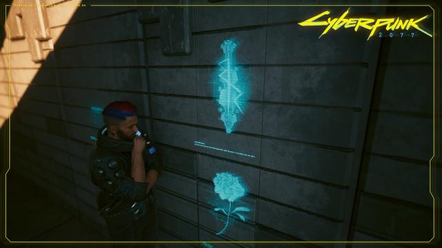 Ein Screenshot aus dem Spiel. Mein männlicher V schaut nachdenklich auf das Grabholo an einer grauen Steinwand auf dem Friedhof von Night City. Die Schrift im Holo lautet:

David Martinez
Du hast mich nie auf den Mond gebracht, aber Du warst trotzdem mit mir dort.