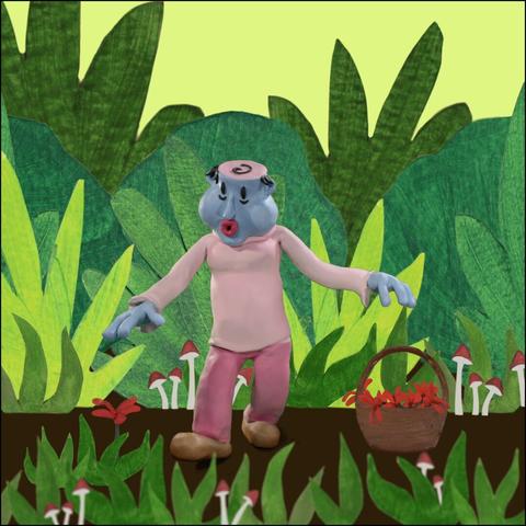 A blue clay character in a nature scene happily picks flowers and drops them in a basket