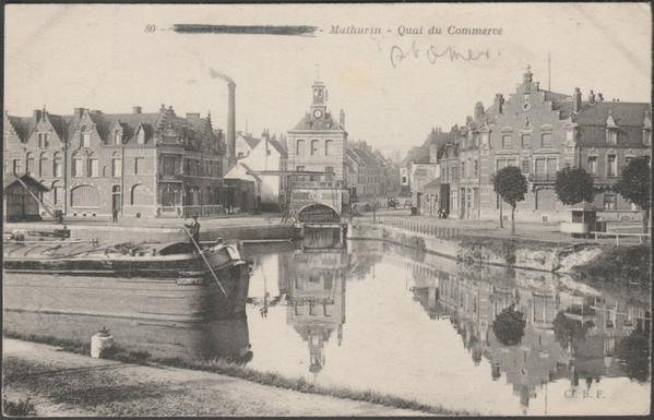 Printed monochrome postcard showing a view of the Quai du Commerce at Mathurin in Saint Omer, France.
Published by Berthaud Fréres, Paris, printed by Catala Fréres, Paris, No 80.
Postally unused, but dated in pencil 12-7-17 and with place name censored.
Very good condition, with very slight corner bumps and light album marks.