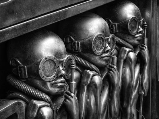 Photo of a metal artwork within the walls of Giger Museum in Gruyères, Switzerland