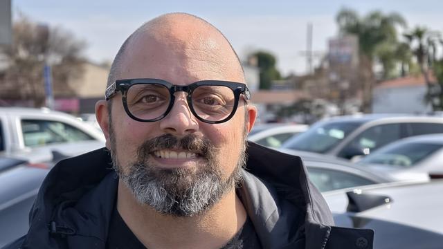 TK Bay wearing the Halliday Prototype Smart Glasses.