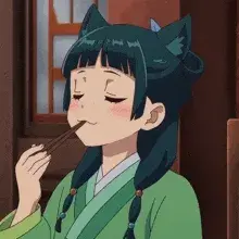 Maomao del anime de los diarios de la boticaria o kusuriya no hitorigoto comiendo con palillos y con el pelo haciendole unas orejas de gato