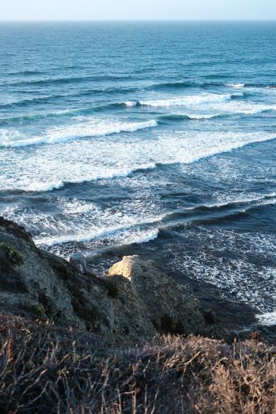 Photo of the sea, as seen from a high viewpoint.