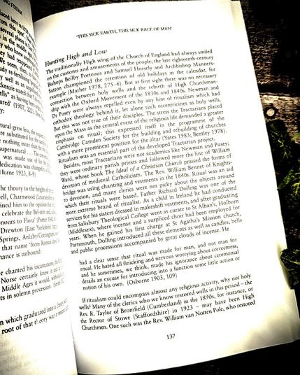 A page from "The Living Stream: Holy Wells in Historical Context," showing the section titled "Hunting High and Low." The text discusses the role of the Church of England's High wing in promoting holy wells, their connection with ritualism in the 19th century, and the influence of high church figures like Bishops Beilby Porteous and Samuel Horsely. The page also covers the views of Reverend William van Notten Pole and his work on restoring holy wells. The text is placed on a rustic background with green leaves.