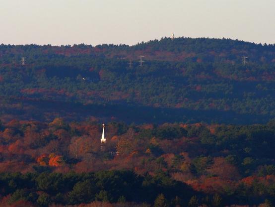 First Parish Unitarian Church, Canton MA and the Moose Hill Fire Tower (9.5 miles), Sharon MA photographed from Buck Hill.