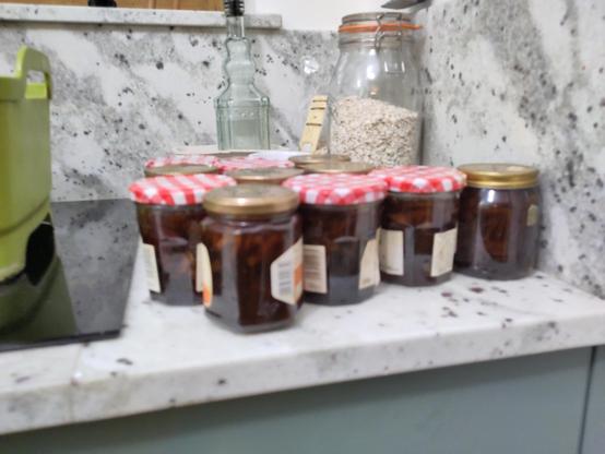 eleven glass jars of newly mad marmalade