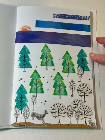 A paper collage has two different colored, green fir trees and trees with bare branches. There is a leaping, gray deer and a small, gray rabbit on a thin strip of brown paper representing the ground. Three strips of different sizes and colored pieces of blue paper are stacked in the upper right to represent the sky. There’s a small, orange sun just above the longest blue strip. Little bits of grass have been hand drawn in olive green ink.