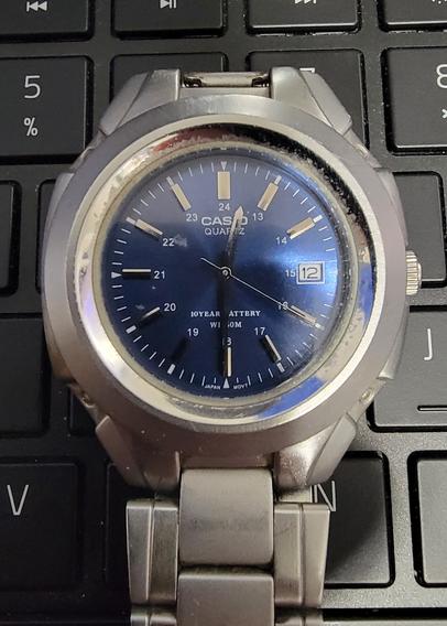 Casio blue face analog watch.