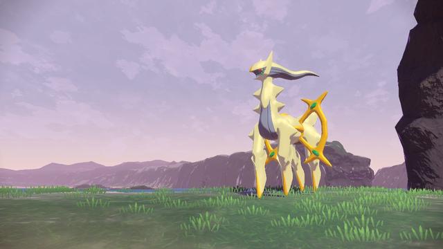 Shiny Arceus in front of the early sunrise in Legends Arceus.