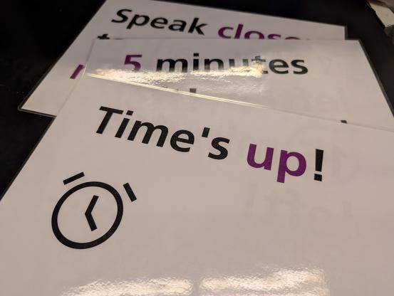 Speak closer, 5 minutes, time's up signs