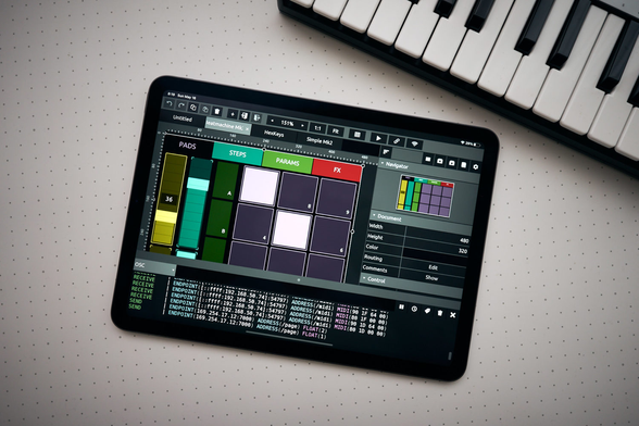 TouchOSC on a tablet next to a MIDI keyboard.