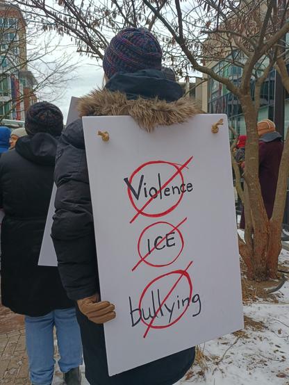 Sign that reads 
Violence 🚫
ICE 🚫
Bullying 🚫