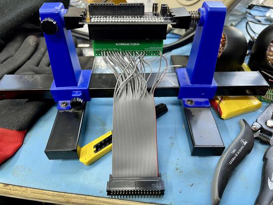A 34-pin floppy drive adapter being wired into a 50-pin floppy adapter. Very Heath Robinson.