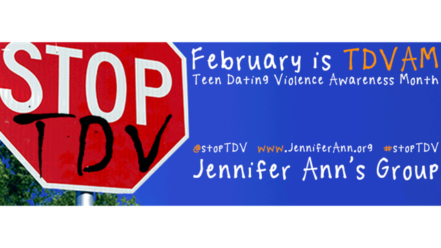 On the left, a bright red stop sign; below "STOP" is a spray-painted "TDV".

On the right, is a deep blue sky with overlaying text: 
February is TDVAM
Teen Dating Violence Awareness Month

@stopTDV www.JenniferAnn.org #stopTDV

Jennifer Ann's Group