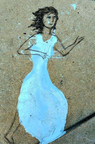 The blue paint spill with charcoal drawing of a woman's head and arms extending from the spill. The effect is of a woman in a blue dress with arms reaching out as she walks.
