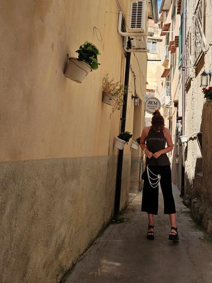 Girl standing in Italian town
