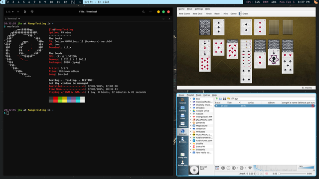 Another DWM screenshot with multiple windows open. Right half of the screen is a terminal window with Neofetch data.  The other two windows open are quarter sized with Kpat and Clementine opened respectfully (Kpat on top and Clementine on bottom)