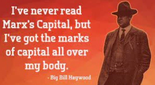 Image of Big Bill Haywood in a suit and fedora, with the quote, “I’ve never read Marx’s Capital, but I have the marks of capitalism all over my body.”
