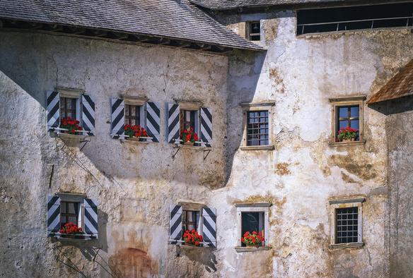 Part of the facade of the Predjama Castle in Slovenia, showing the small windows with striped shutters and windowboxes with red flowers.

https://joan-carroll.pixels.com/featured/predjama-castle-windows-slovenia-joan-carroll.html

#predjama #castle #windows #shutters #striped #windowboxes #flowers #rustic #weather #slovenia #travel #travelphotography #fortress #historic #AYearForArt #buyIntoArt #giftideas #wallart #artforsale @joancarroll