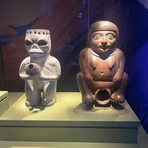 Pictured on left: Inhabitant of the Underworld with Erect Penis; Ceramic Ceremonial Vessel; Moche Culture (100 C.E. - 800 C.E.); Northern Coast; Larco Museum, Lima, Peru. Museum number ML004199. Pictured on right: Woman in Labour or Coitus Position; Ceramic Ceremonial Vessel; Moche Culture (100 C.E. - 800 C.E.); Northern Coast; Larco Museum, Lima, Peru. Museum number: ML004426.