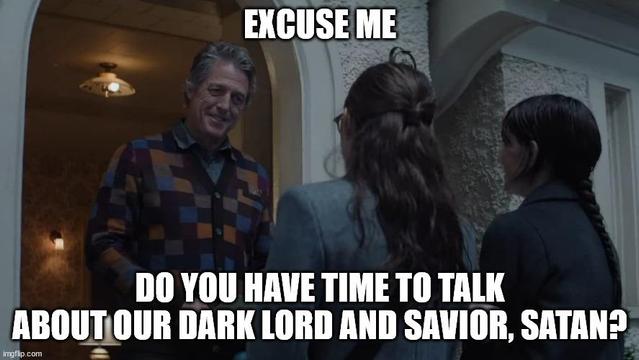 A smiling man in a door way with two young women facing him. Excuse me. Do you have time to talk about our dark lord and savior, Satan?