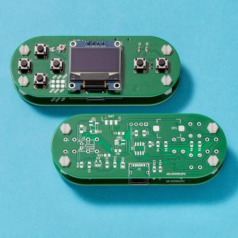 Front and reverse views of game console.