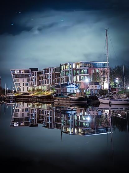 Night view of modern architecture in the Stade harbour area, northern Germany