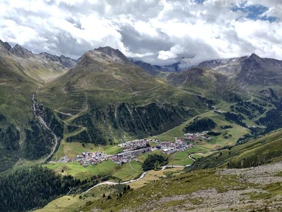 View from one side of the Ötztal valley to the other with the village Obergurgl down below.