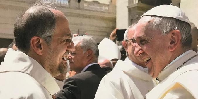 Pope Francis greets Discalced Carmelite Superior General Saverio Cannistrà, OCD in Saint Peter's Square at the canonization of Mary of Jesus Crucified Baouardy, the foundress of the Carmel of Bethlehem. Mariam was canonized on 17 May 2015. Image credit: Discalced Carmelites