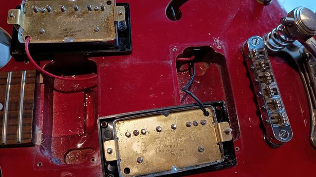 Pickups of aDot 335 pulled and flipped. Both have a sticker that reads "57 CH (G) DOT: NECK, BRIDGE. LP: NECK"