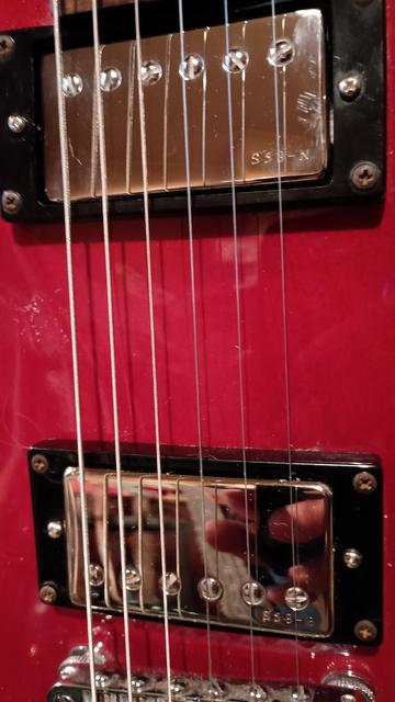 The new pickups are in the guitar. "S 58 - N" and "S 58 - B".
They still have plastic on them.
The pickguard is still off.