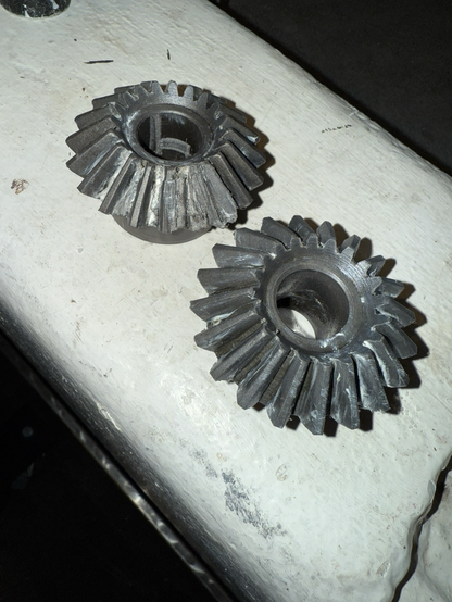Bevel gears one with broken teeth