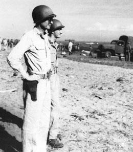 Patch observing the landing of troops and supplies