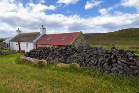 A traditional Scottish Highland cottage with stacks of peat ready for fuel, surrounded by the rugged beauty of the Highlands. A glimpse into timeless rural life.


#Scotland #Highlands #CottageLife #TraditionalScotland #RuralLife #PeatStack #HighlandHeritage #CountrysideEscape #TravelScotland #CulturalHeritage