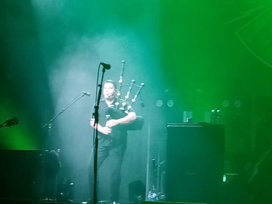 Bagpiper solo during It's a long way to the top if you wanna rock and roll
