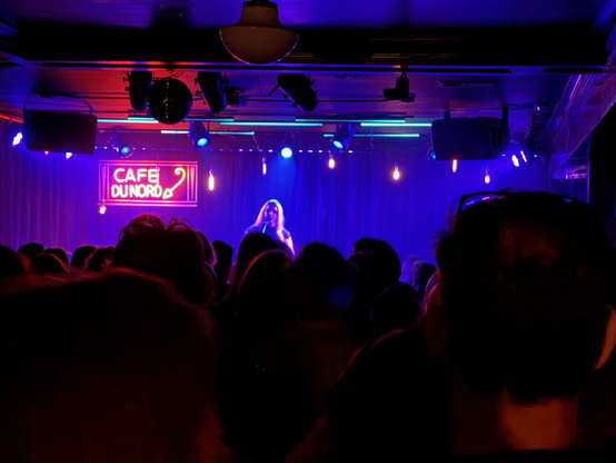Sylvaine, with lkng blonde hair, singing on stage at a very crowded Cafe du Nord, Feb. 7, 2025.