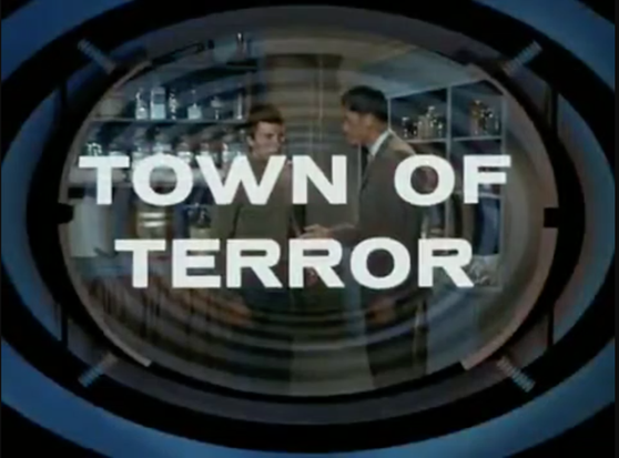 Screenshot of the titles showing the episode 30
TOWN OF TERROR
The tunnel with the “monitor” and the two heroes in a room with shelves filled with bodies