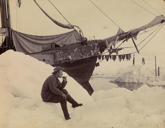 image/jpeg a man smokes a pipe sitting on a bank of ice with a wooden sailing ship locked in the ice behind him.
https://commons.m.wikimedia.org/wiki/File:No-nb_bldsa_q3c062.jpg#mw-jump-to-license
