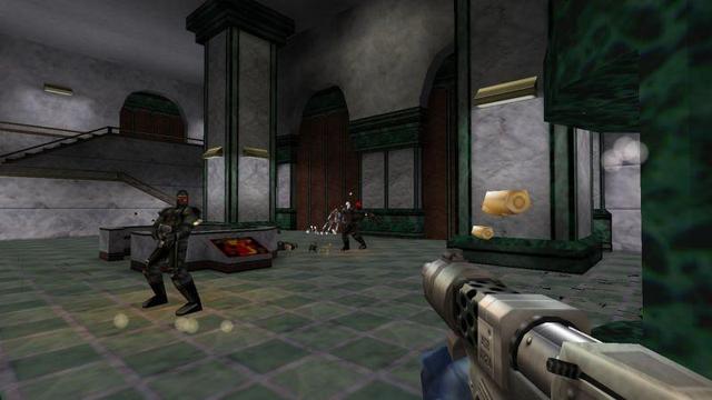 🕶️ An FPS view in which the player fires on masked guards in a very large hall.

📚️ SiN is a FPS (released in 1998) based on the Quake 2 engine. In the year 2037, inefficient police forces have been supplanted by private security companies. The player - John Blade, commands one of them, investigating a new drug - U4 - which is believed to be linked to a case of mutants in the city. Crossing paths with a Hacker, he's in for a few surprises... The scenario is non-linear, changing according to the player's decisions. Dominatrix is an engine compatible with the Nightdive studio's enhanced version, providing better graphic resolution and gamepad support.