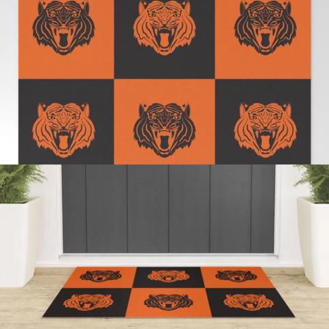 Our orange and black tiger is shown on a welcome mat.